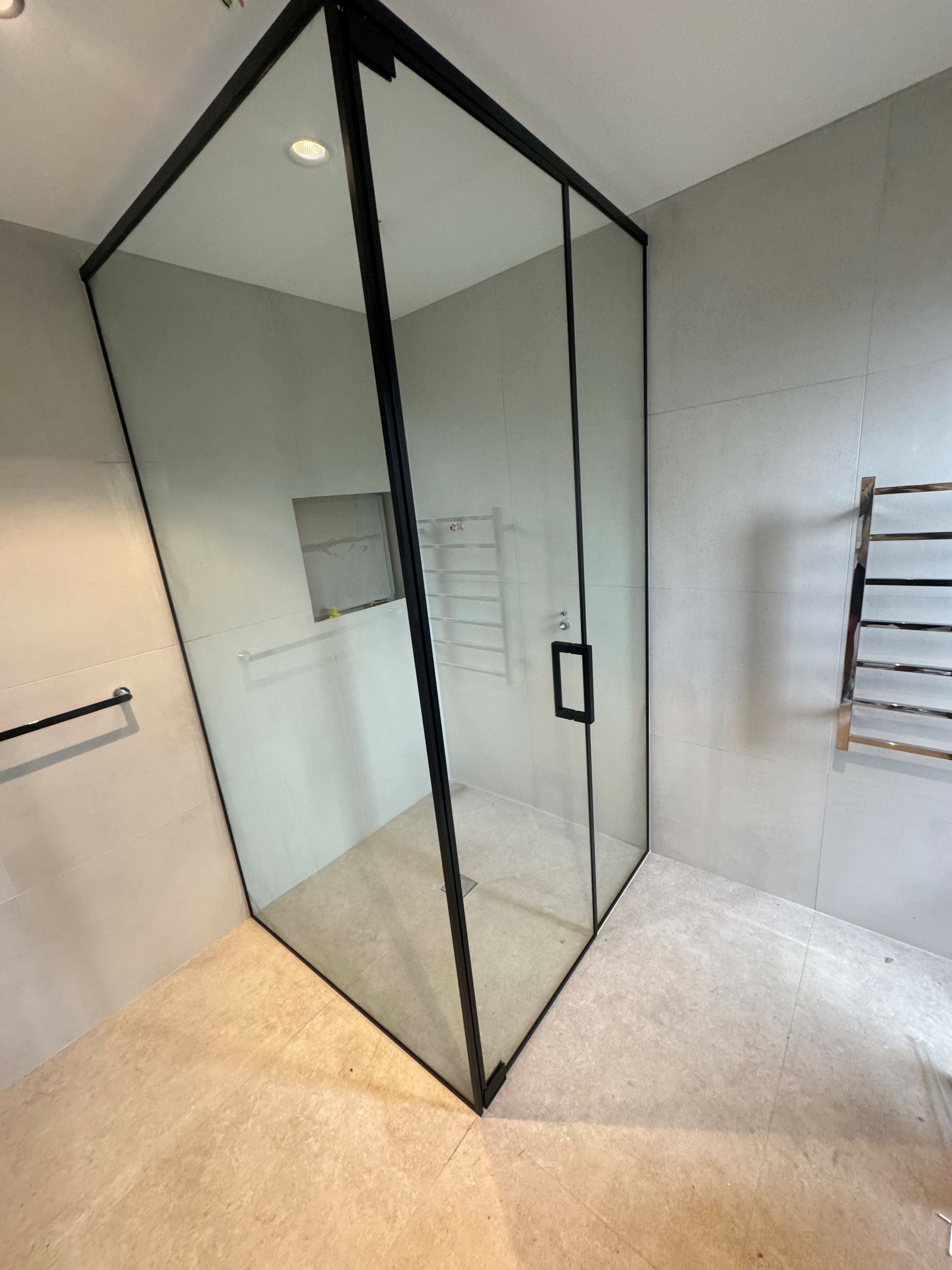 Black framed shower installed by 30 Build Group in Adelaide