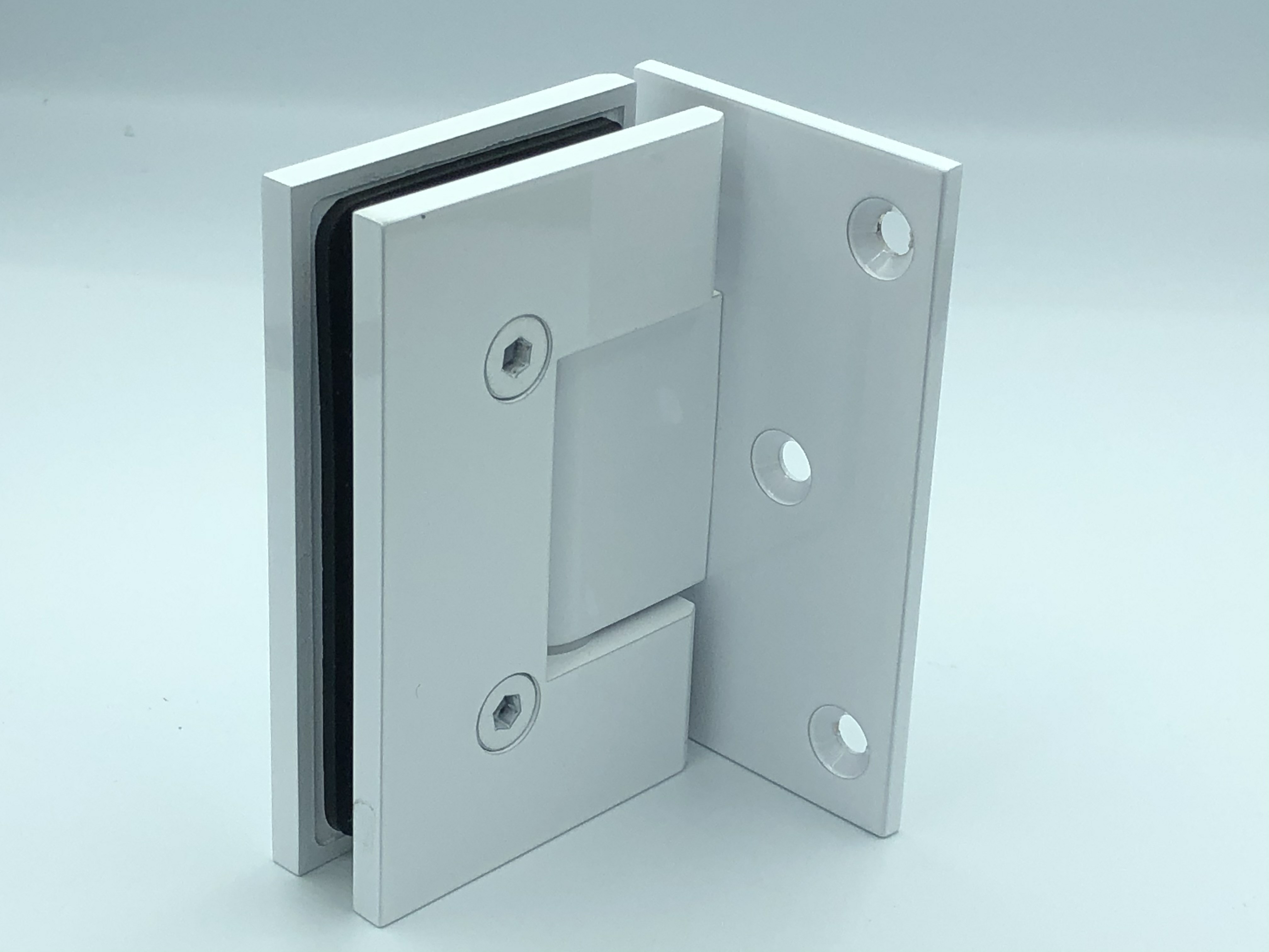 White L shaped glass to wall hinge